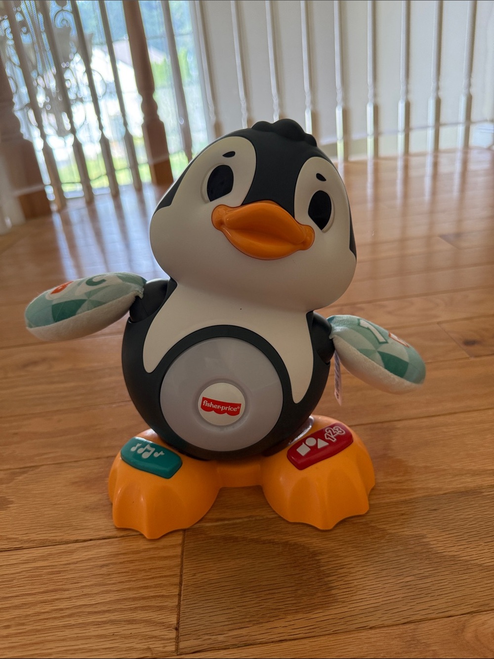 Fisher-Price Black, White & Orange Penguin Musical Learning Toy
